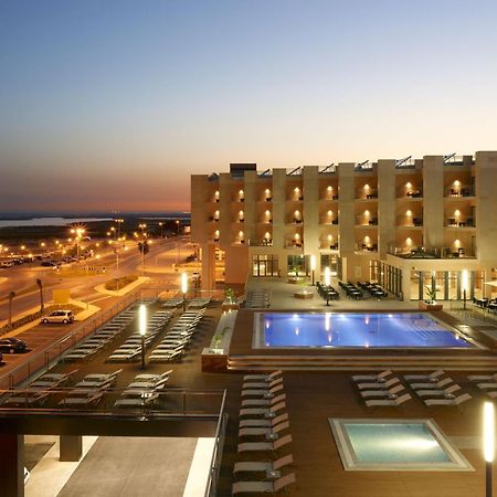 فندق ريال مارينا هوتل آند سبا Olhão المظهر الخارجي الصورة The hotel at night